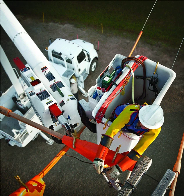 A lineman working on power lines.